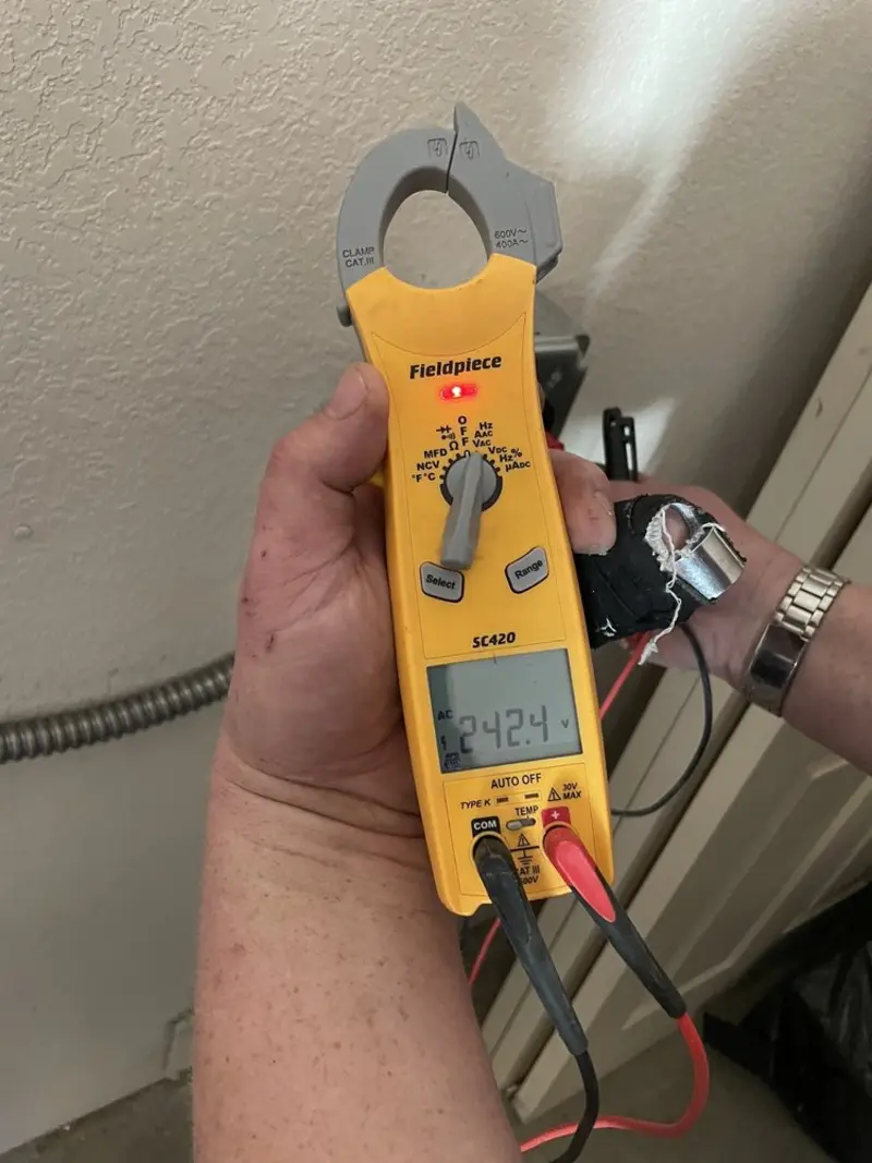Voltage testing with clamp meter during Hot Tub / Pool Electrical Wiring in Duluth
